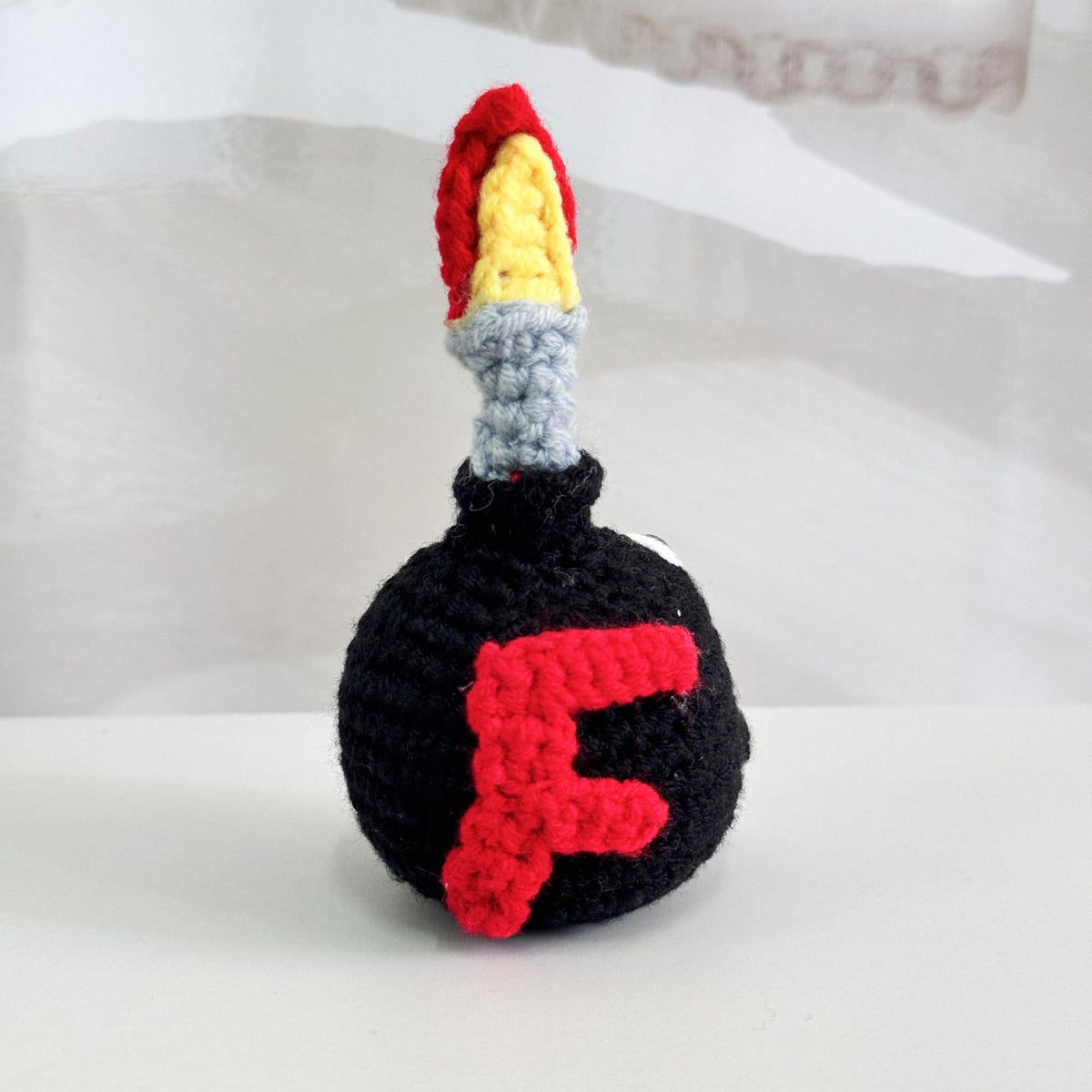 Handmade Crochet F-Bomb With Base